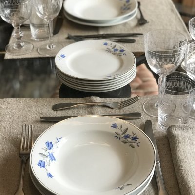 Vintage table set with blue flowers