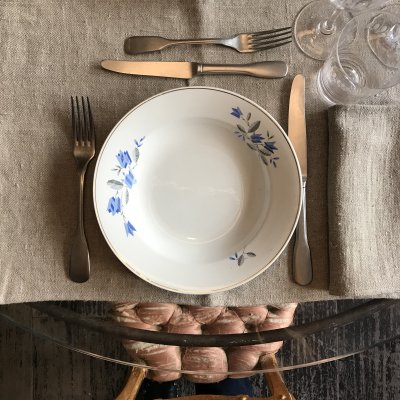 Vintage table set with blue flowers