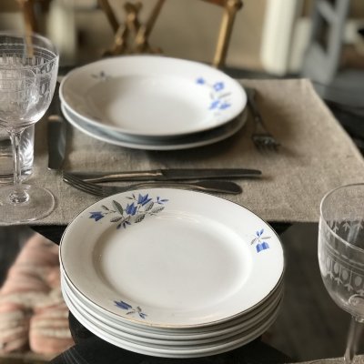 Vintage table set with blue flowers