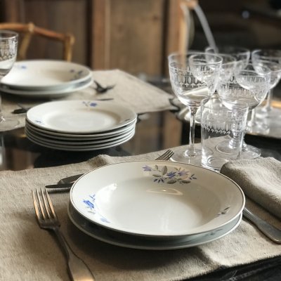 Vintage table set with blue flowers